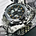 CASIO DOBLE HORA STYLE. Hombre. Plateado Naranja.