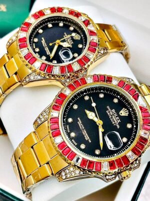PAREJA ROLEX SUBMARINER GEMAS. Dorado Rojo.