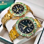 PAREJA ROLEX SUBMARINER GEMAS. Dorado Verde.