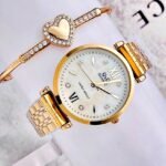 Q&Q PLANO NUMEROS ROMANOS. Dorado.