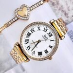 Q&Q NUMEROS ROMANOS. Dorado.