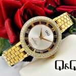 Q&Q MURANO NUMEROS ROMANOS. Mujer. Dorado.