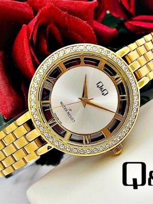 Q&Q MURANO NUMEROS ROMANOS. Mujer. Dorado.