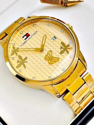 TOMMY HILFIGER LIBELULA. Dorado.