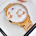 TOMMY HILFIGER LIBELULA. Mujer. Oro Rosa.