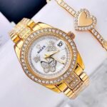 ROLEX BUTTERFLY. Mujer. Dorado.