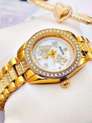 ROLEX BUTTERFLY. Mujer. Dorado.