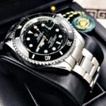 ROLEX SUBMARINER. Hombre. Plateado Fondo Negro.