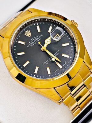 ROLEX  STETIC. Hombre. Dorado Fondo Negro.