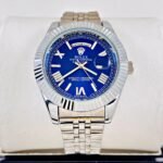 ROLEX PRESIDENCIAL NUMEROS ROMANOS. Hombre. Plateado Fondo Azul.