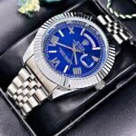 ROLEX PRESIDENCIAL NUMEROS ROMANOS. Hombre. Plateado Fondo Azul.