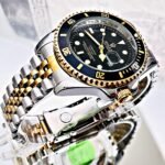 ROLEX SUBMARINER PULSO TRENZADO. Hombre. Bicolor Fondo Negro.