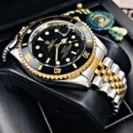 ROLEX SUBMARINER PULSO TRENZADO. Hombre. Bicolor Fondo Negro.